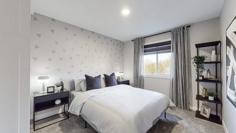 Secondary bedroom in Sterling Home's Atlas Showhome in Kinglet by Big Lake