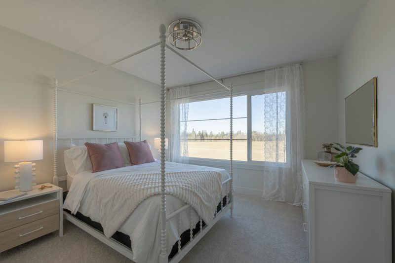 Secondary Bedroom Room in Anthem's front drive 120 showhome in Kinglet by Big Lake