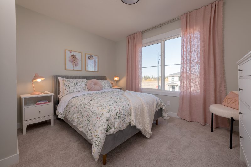 Secondary bedroom in Anthem's front drive 110 showhome in Kinglet by Big Lake