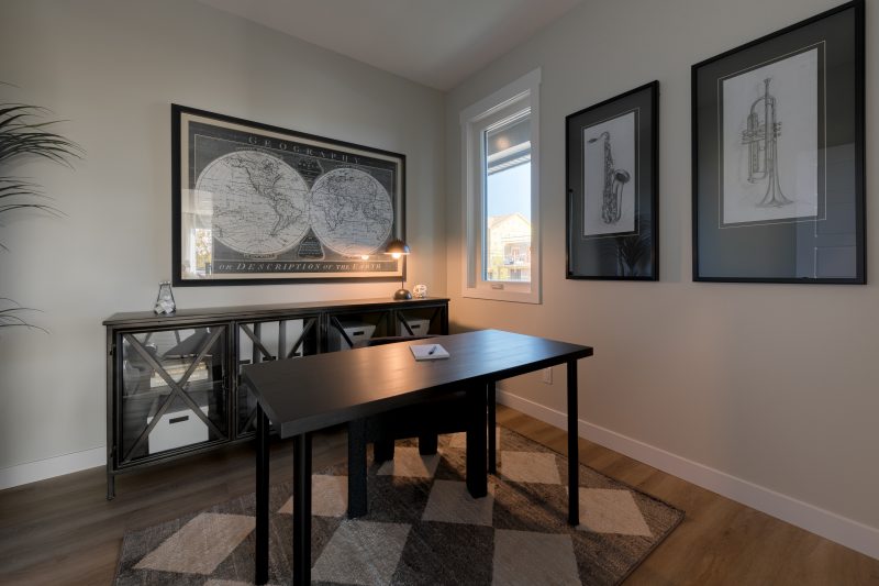 Main floor office in Anthem's front drive 110 showhome in Kinglet by Big Lake